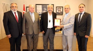 KONUKOĞLU’NA TEŞEKKÜR PLAKETİ