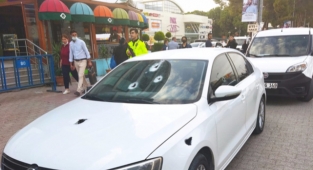 Park halindeki otomobile tüfekle ateş açan zanlı yakalandı