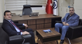 Karaisalı Kaymakamı Mert Kumcu, Anadolu Ajansı ziyaret etti