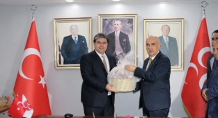 Bakan Kirişci'den MHP’ye ziyaret