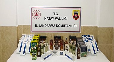 Evlerinde kaçak ürünler bulunduran 2 zanlı yakalandı