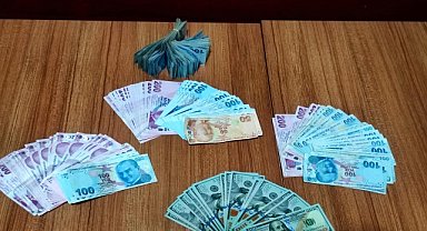 ATM önünde düşürülen parayı alan şüpheli yakalandı