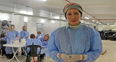 Güney Koreli kadın, yardım seferberliğine katıldı