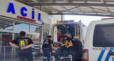 Eşini ve akrabasını silahla yaraladı