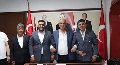 MHP Seyhan’da Bener bayrağı Çetin’e devretti