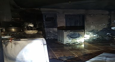 Adana'da bir ev çıkan yangında hasar gördü
