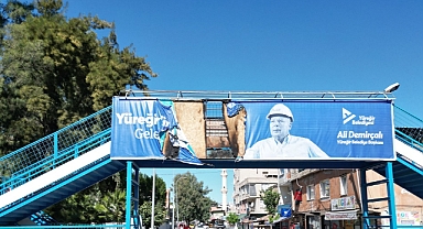 DEMİRÇALI'NIN AFİŞLERİNİ YAKTILAR