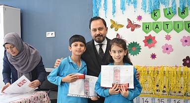 BAŞKAN ULUDAĞ KARNE DAĞITTI