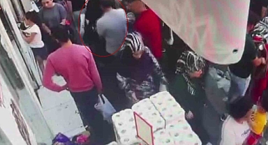 KADININ ÇANTASINDAN PARA ÇALDI!